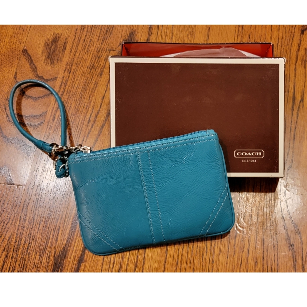 small teal Coach wristlet
